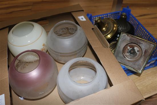 Collection of brass oil lamp bases & 4 glass shades